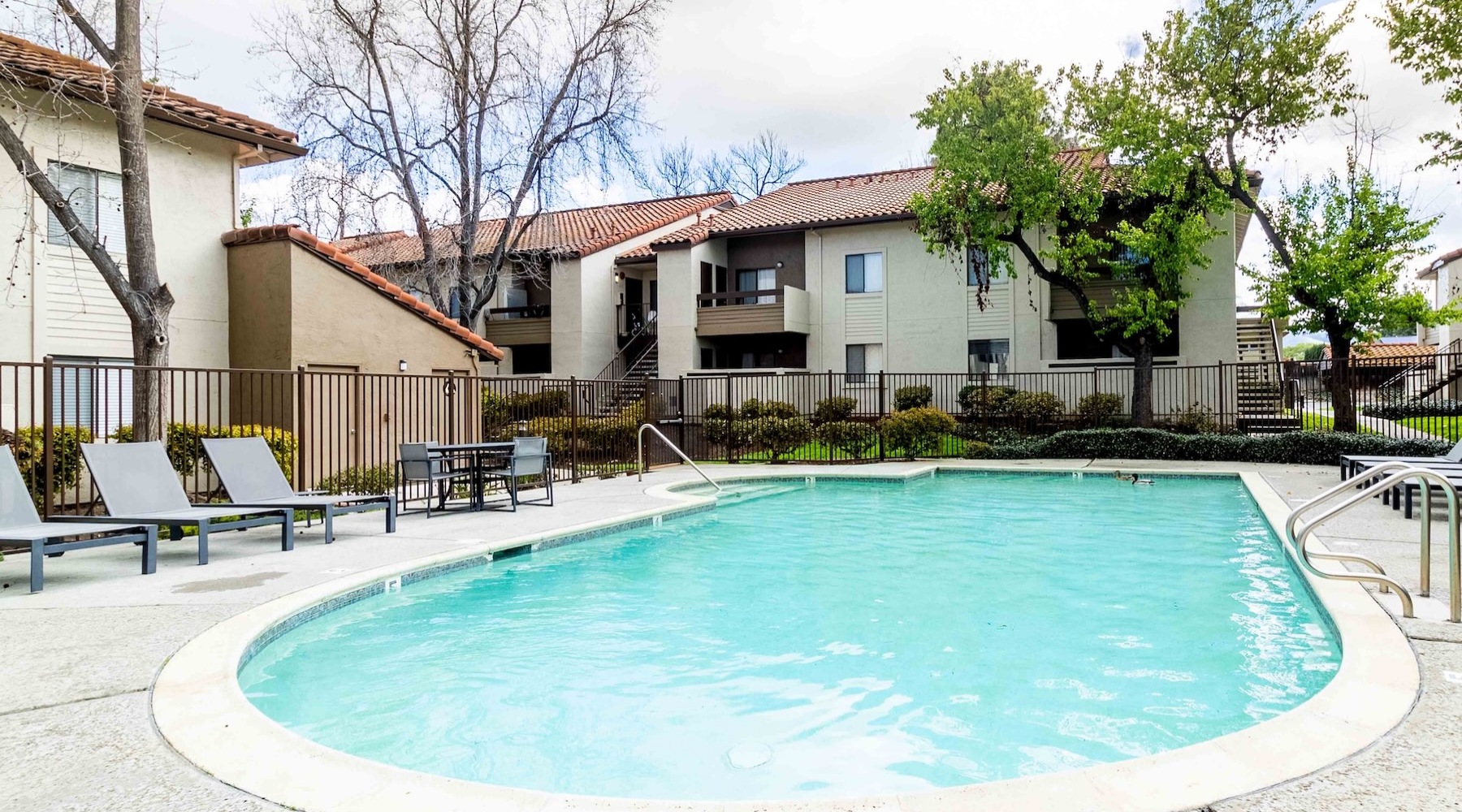 pool with seating in a courtyard